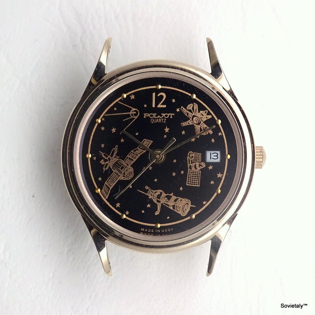 Poljot Satellite e Stazioni Spaziali Orologio Poljot - Orologio Poljot degli anni '80 con quadrante decorato da satelliti e stazioni spaziali, cassa in ottone dorato.