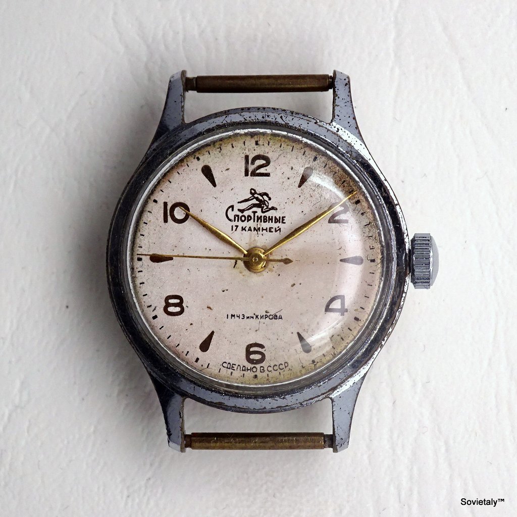 Sportivnie corridore anni '50 Orologio Sportivnie - Orologio Sportivnie degli anni '50, meccanico calibro 2634 con 17 rubini, cassa in ottone cromato, quadrante con immagine di un corridore.